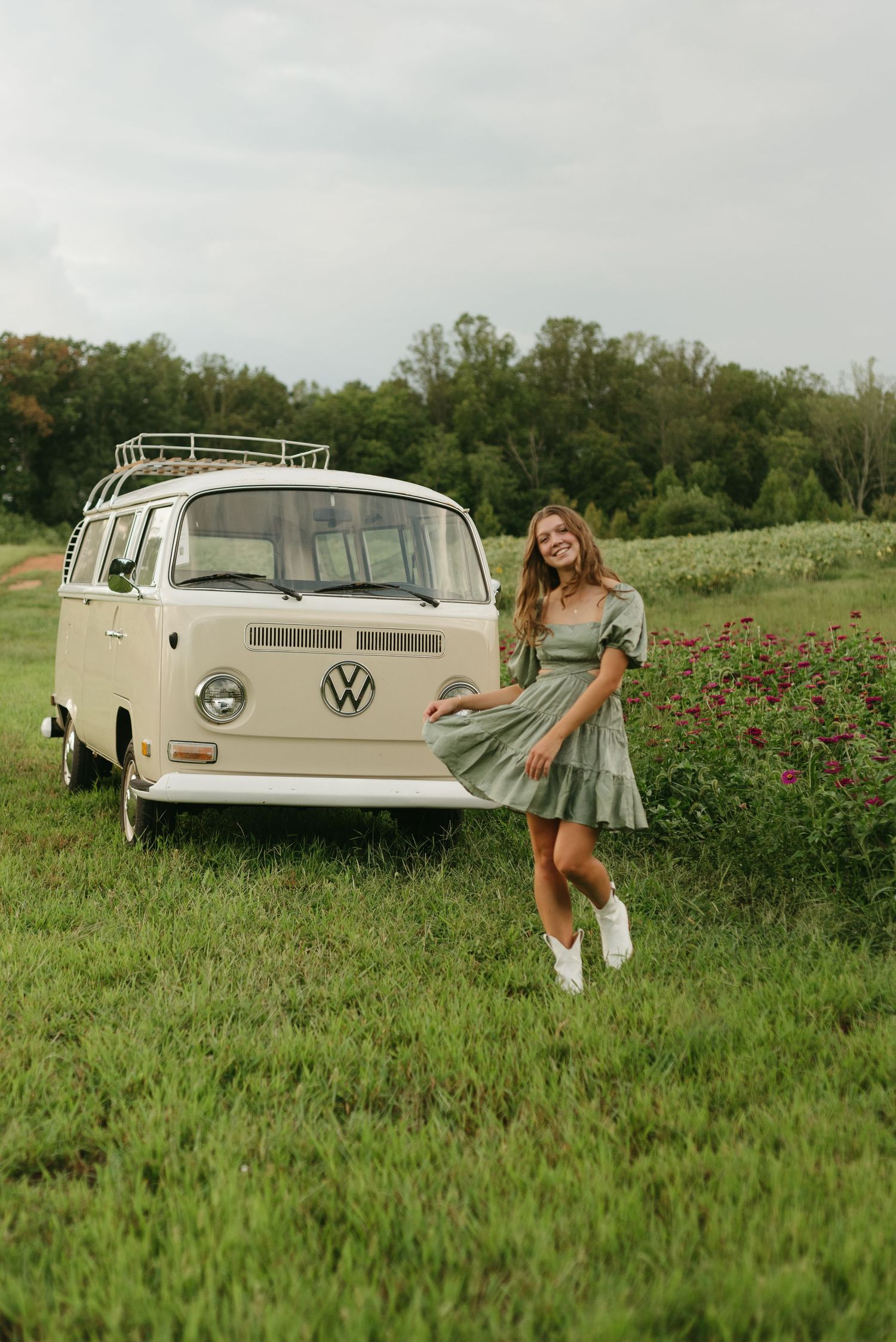 A retro Volkswagen van creates a nostalgic scene in a meadow of wildflowers.