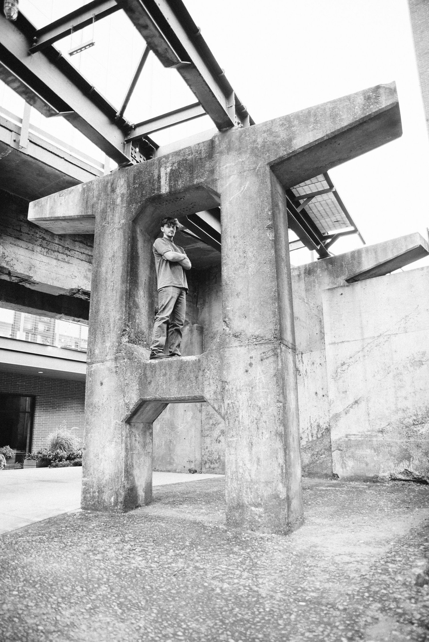 Series of black and white skateboarding action shots under concrete structures.