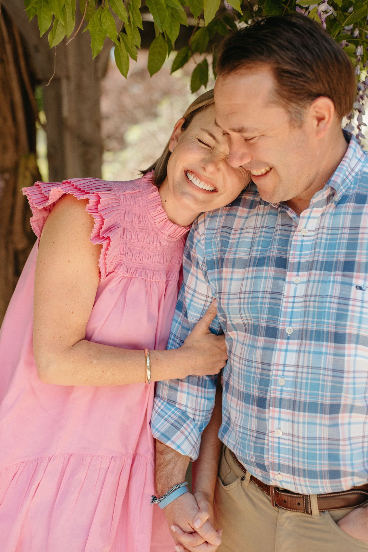 Close-up series showing tender family moments in pink and blue attire.