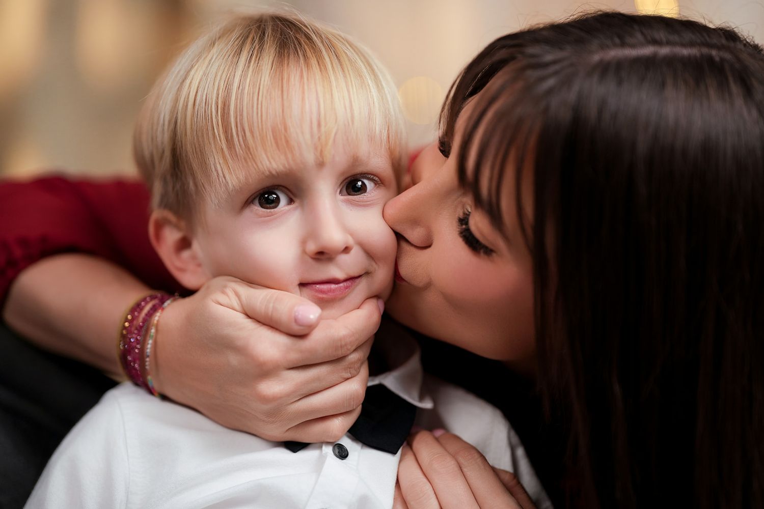 Sweet family moments captured in a series of intimate portrait photographs.