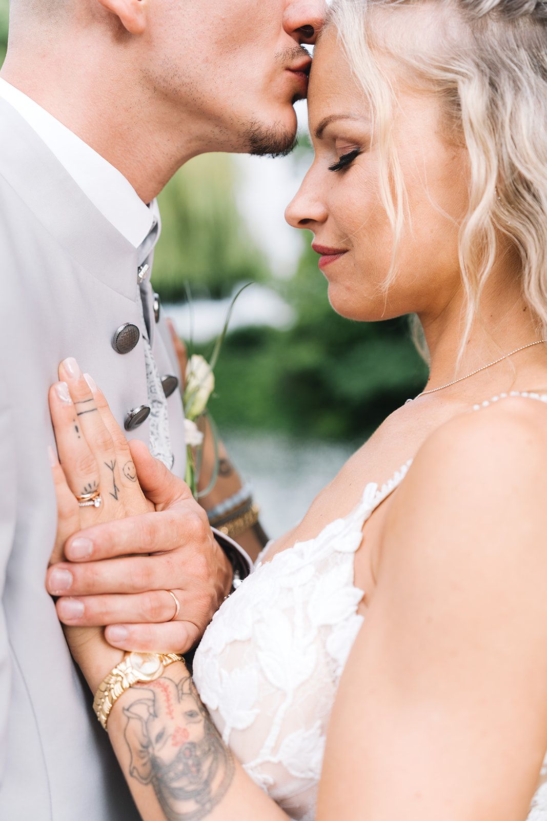 Close-up romantic moments between newlyweds in formal wedding attire.