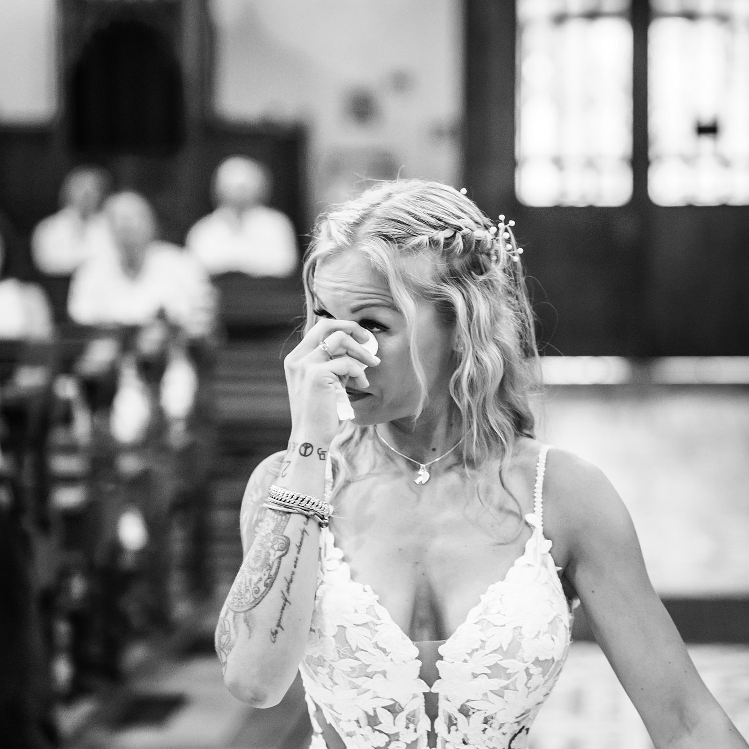 Black and white emotional bridal portraits showing genuine expressions.