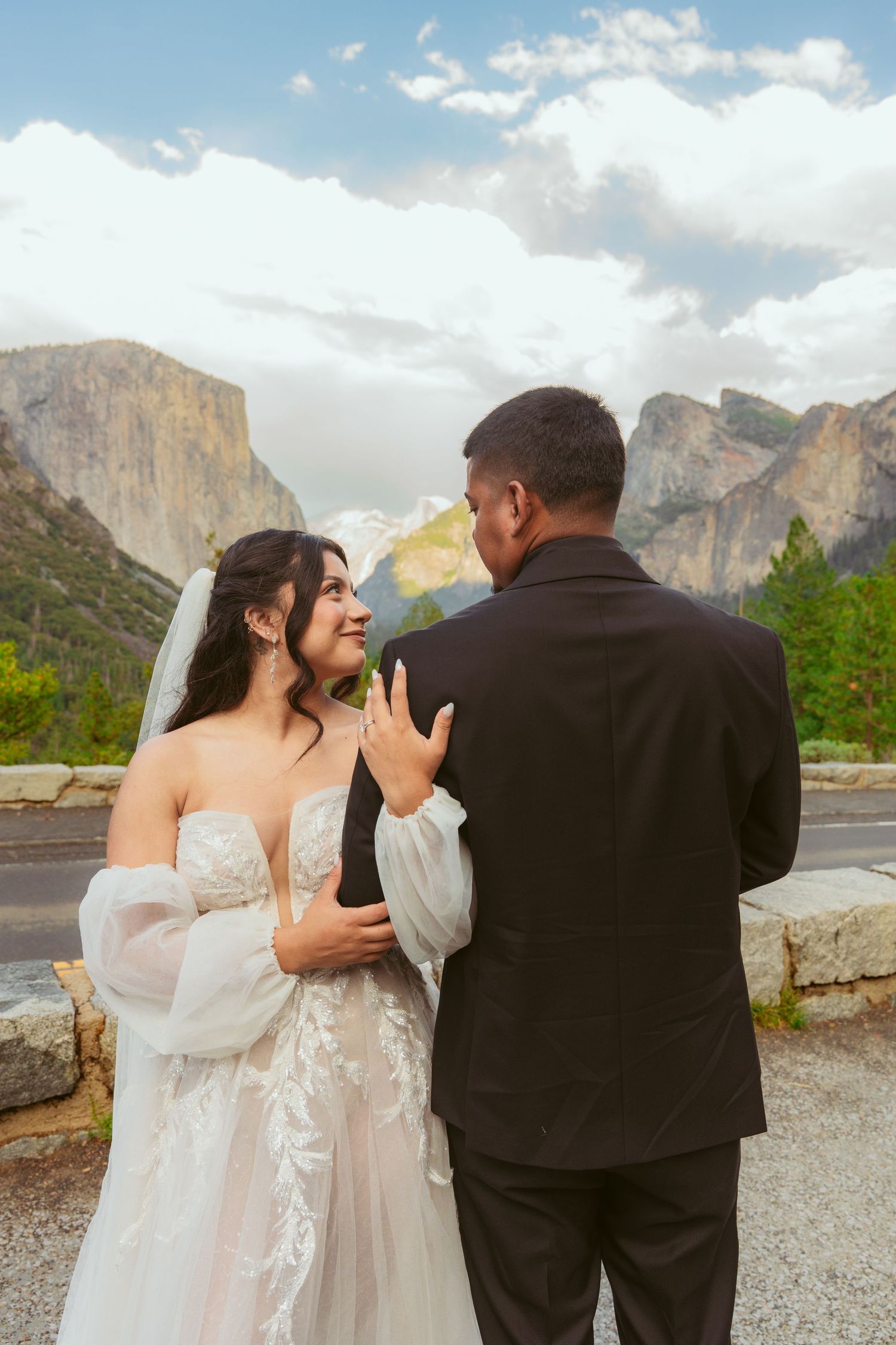 Candid wedding moments captured against the scenic backdrop of Yosemite National Park.