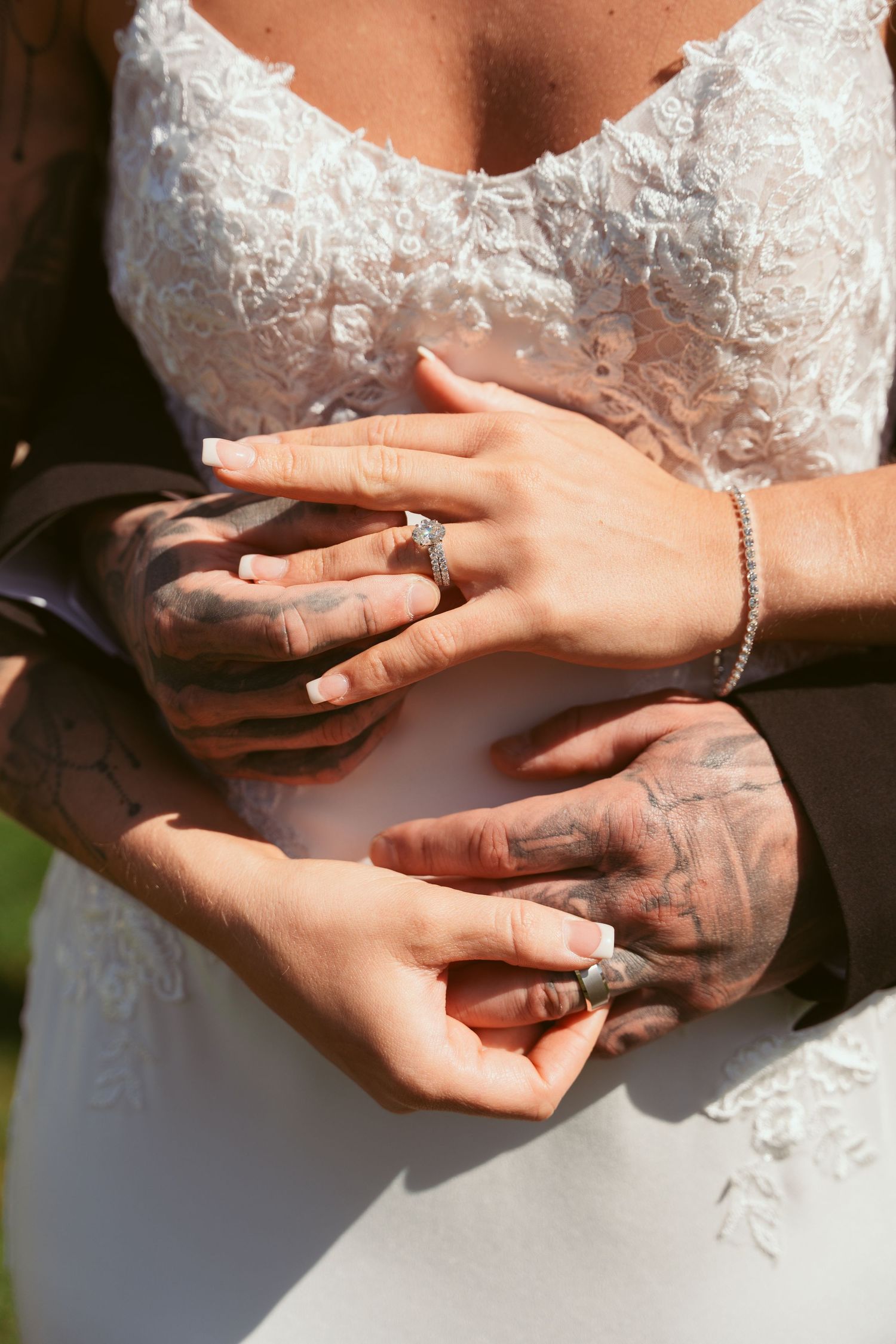 Close-up sequence of hands exchanging wedding rings during ceremony.