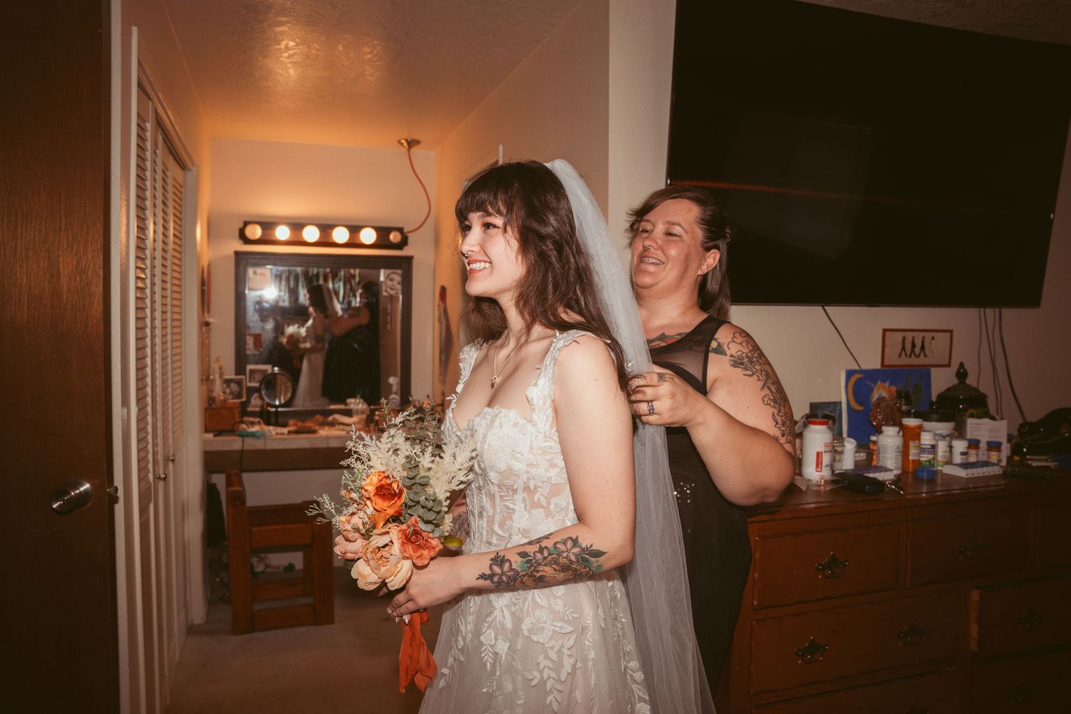 Indoor celebration with warm lighting and dancing captured in candid moments.