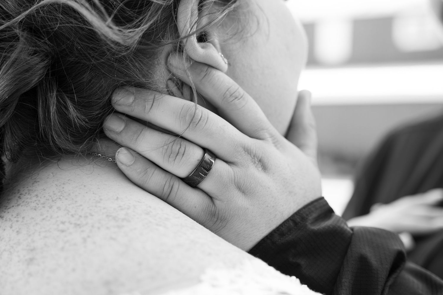 Black and white photo series showing hands touching and caressing in intimate, artistic compositions.