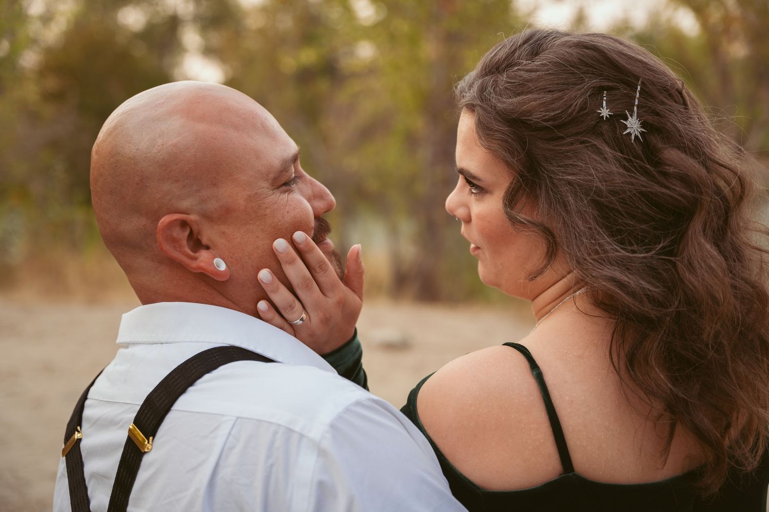 Romantic outdoor portrait series of a couple sharing intimate moments.