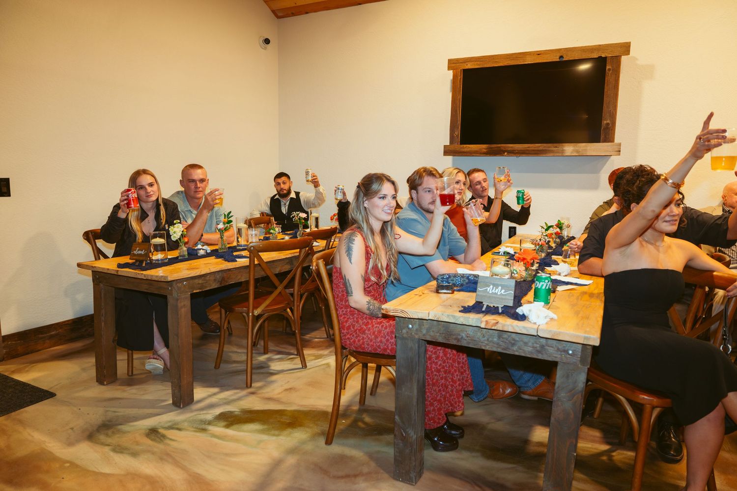 Wedding reception space with casual seating arrangements and natural lighting.