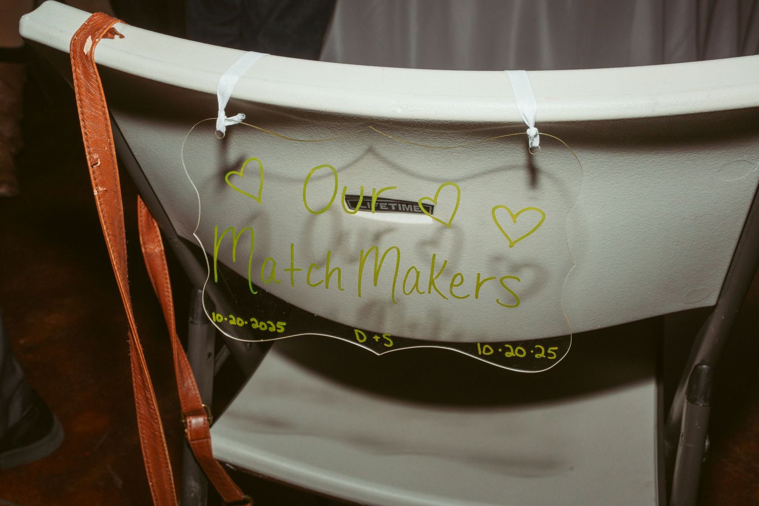 Decorative white lampshade with handwritten messages and hearts.