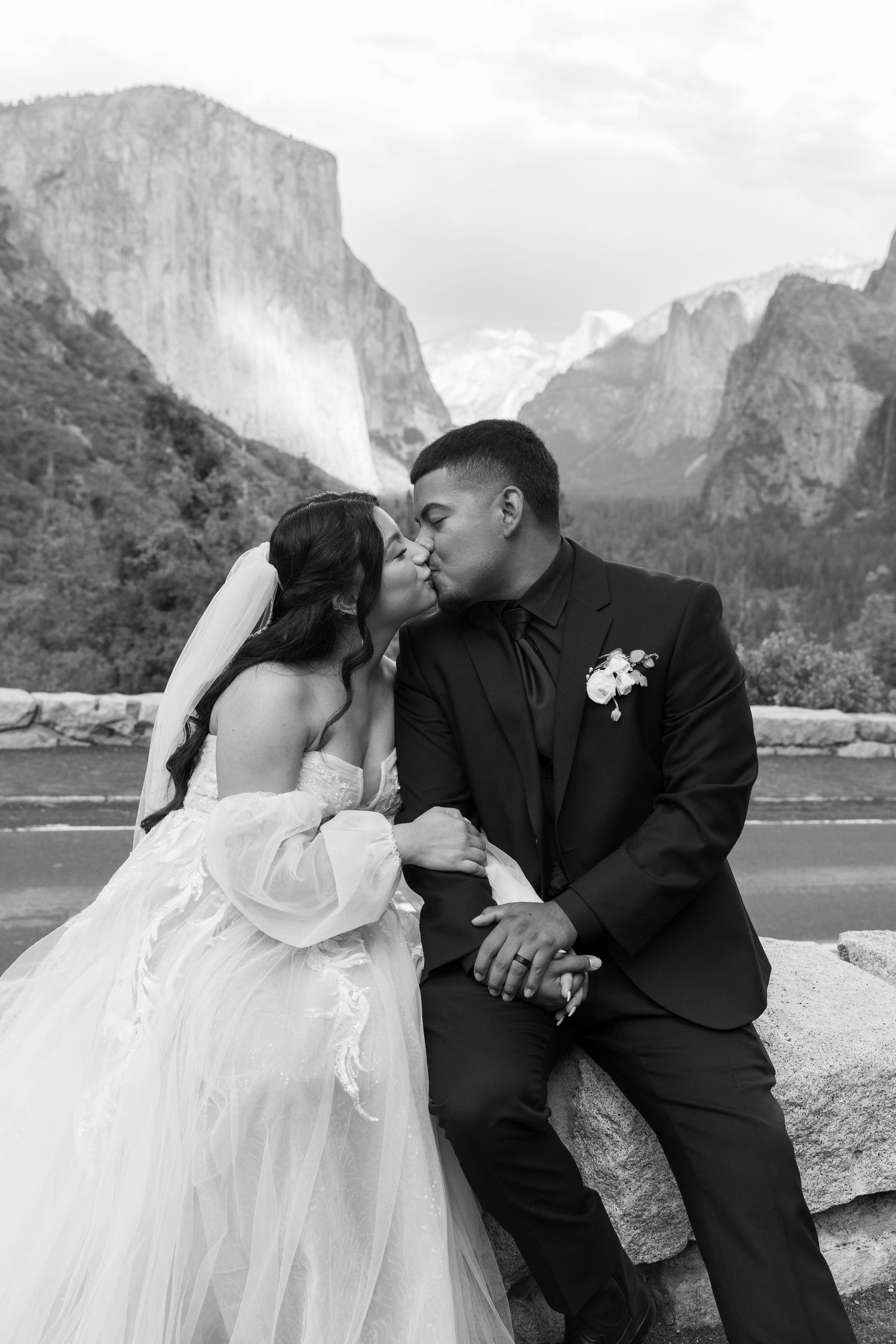 Intimate wedding portraits captured along the shores of Yosemite Valley with El Capitan in the background.