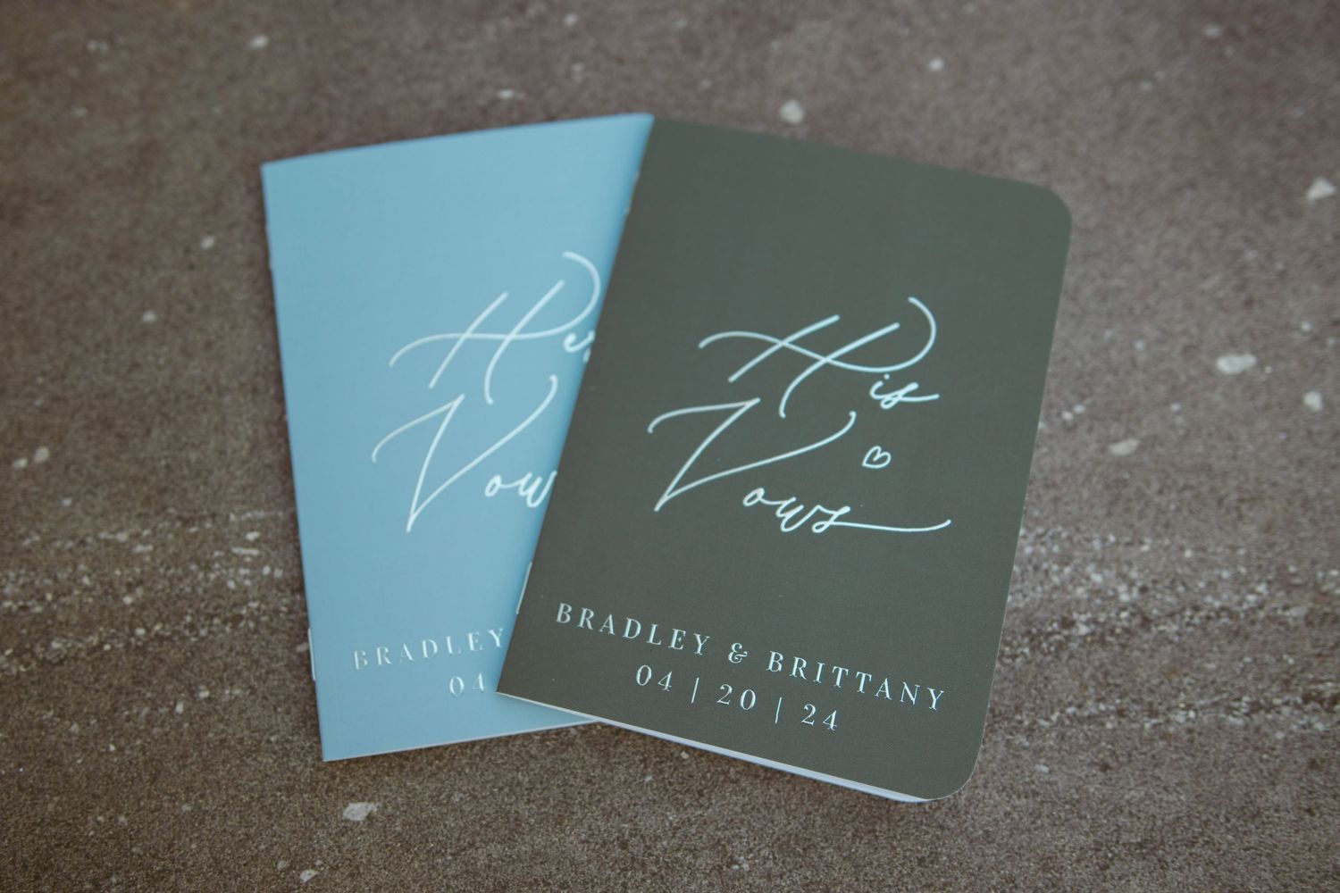 Wedding stationery in teal and white colors featuring elegant calligraphy.