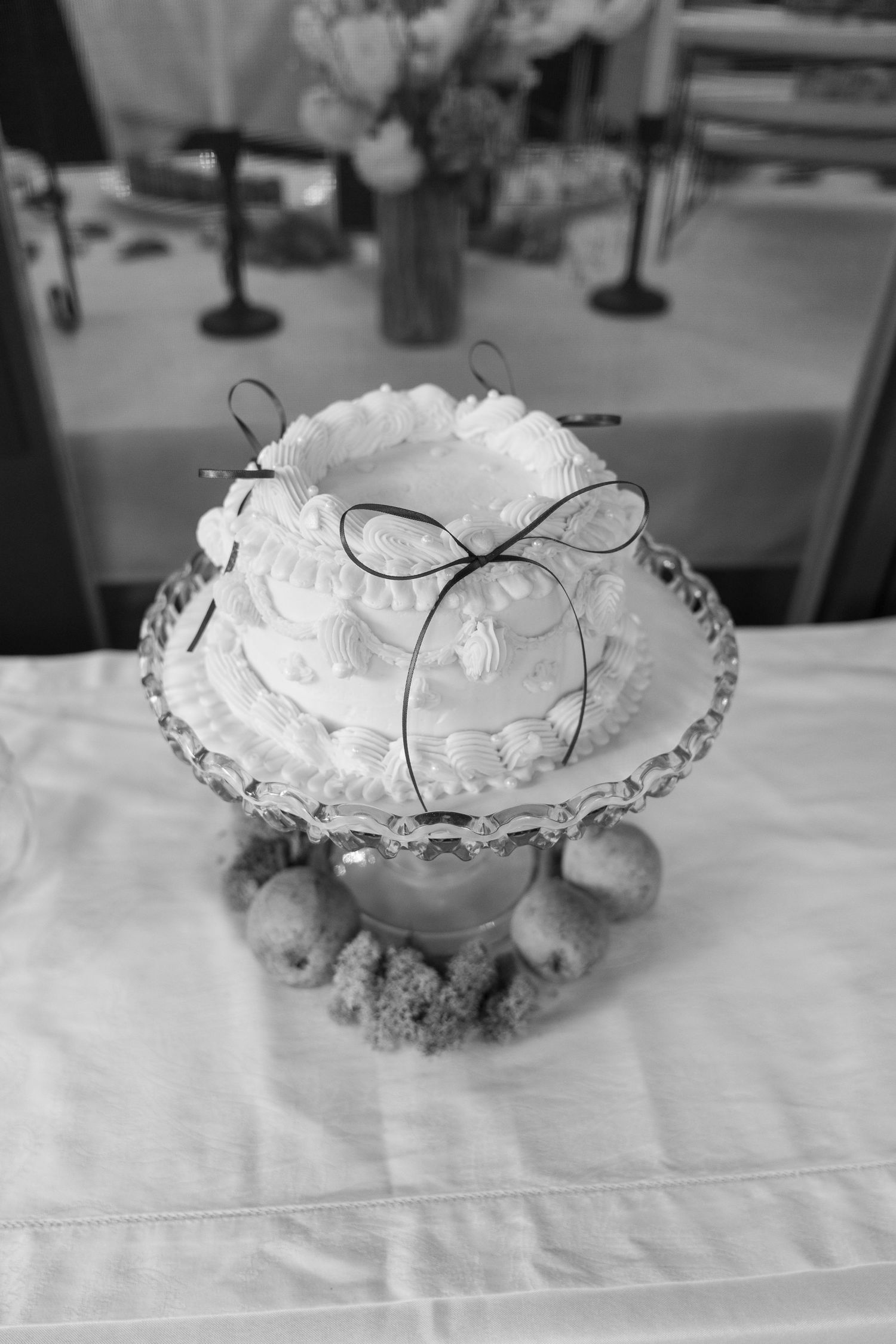 Crystal bowl filled with white ice or sugar crystals on an elegant table setting.