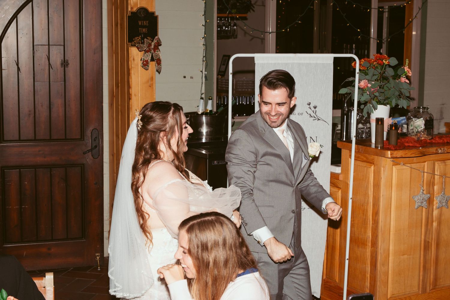 Wedding celebration sequence showing dancing and festivities in an indoor venue.