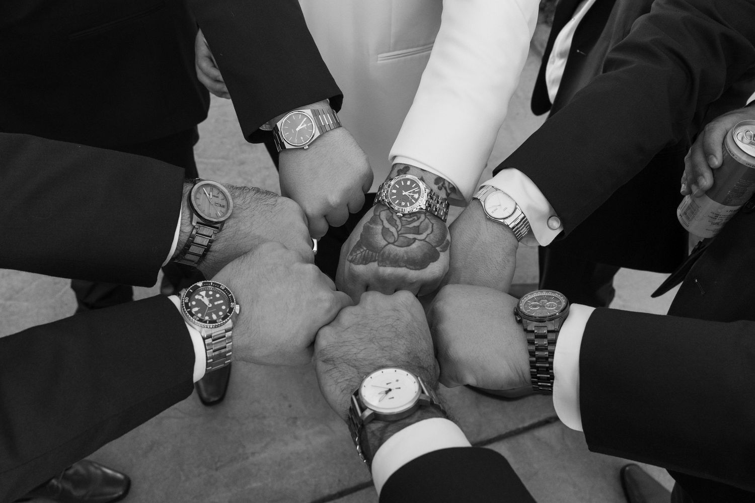 Close-up shots of hands showing wedding rings and watches in black and white photography.