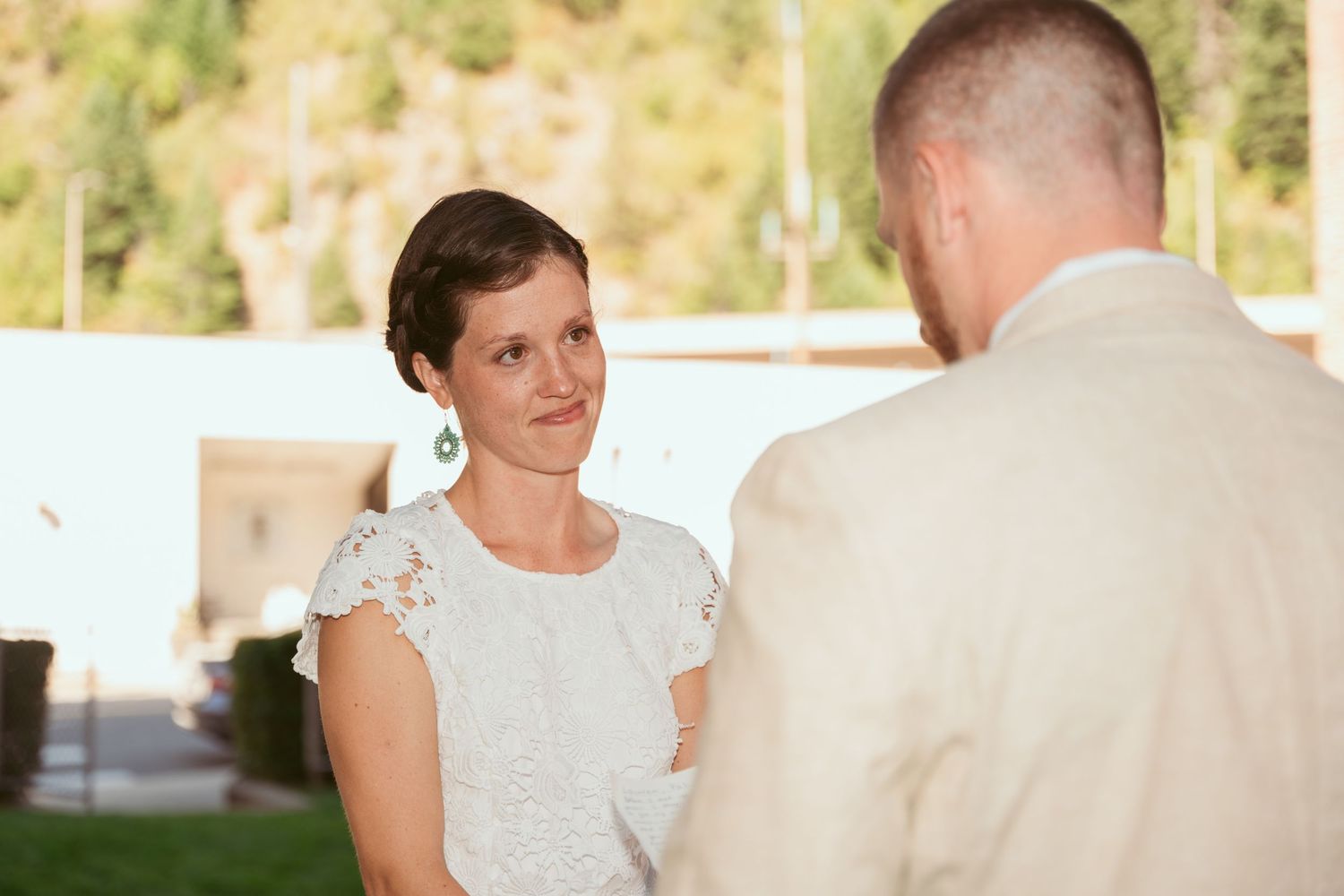 An emotional exchange between a couple during their wedding vow reading.