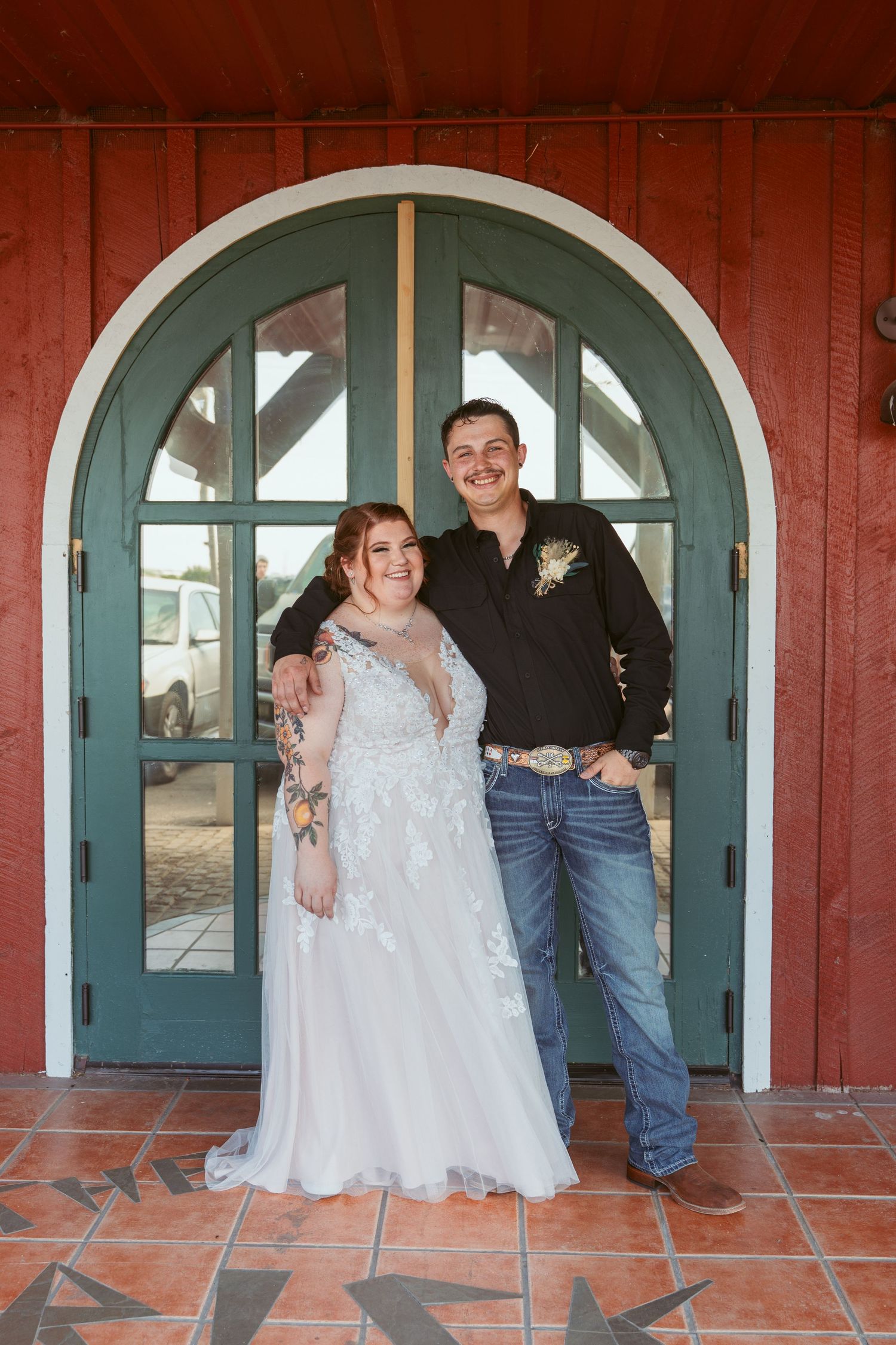 Wedding couple poses in sequence against red building backdrop with teal arched doorways.