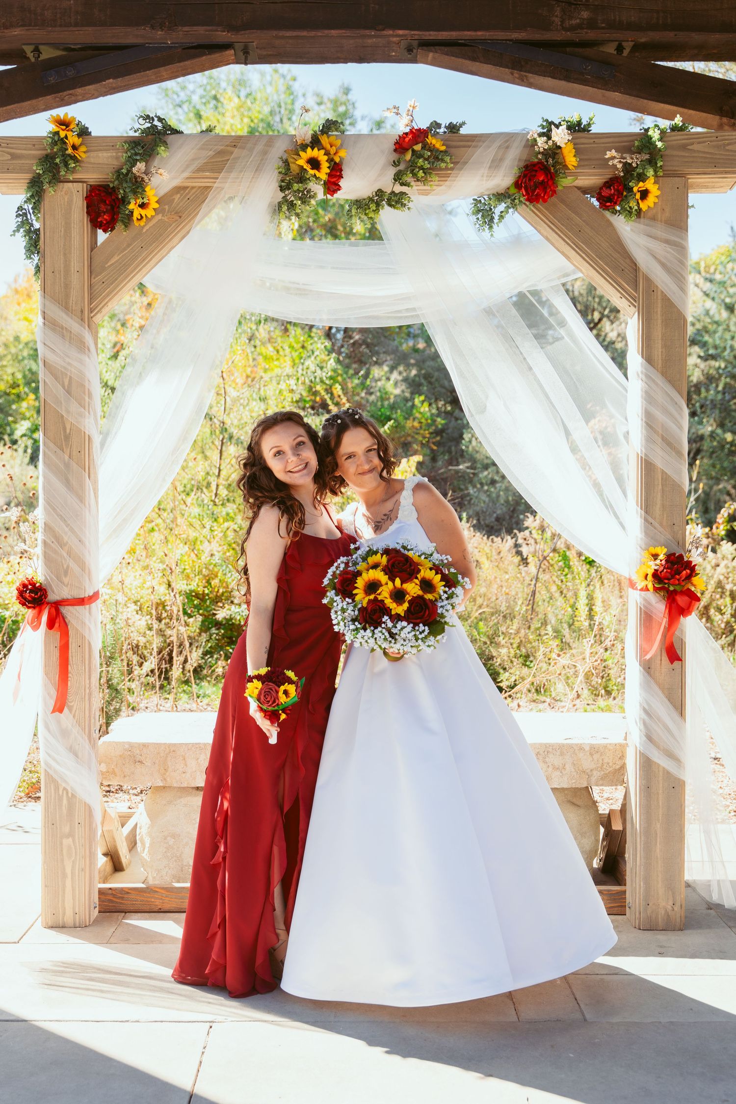Joyful wedding celebration photos under a decorated pavilion with red and white color scheme.