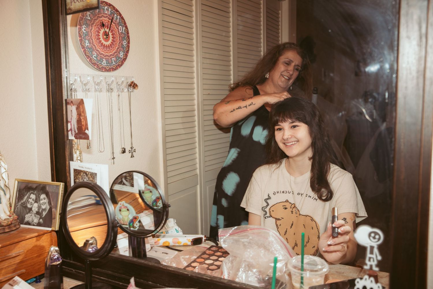 A cozy indoor celebration with vintage decor and warm lighting creates an intimate atmosphere.