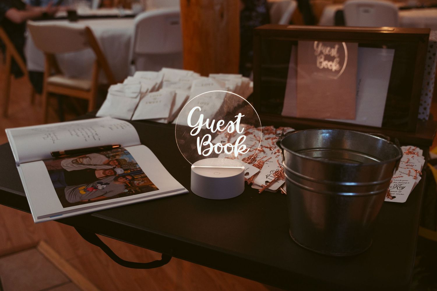Rustic coffee shop interior with wooden tables and warm lighting creates a cozy atmosphere.