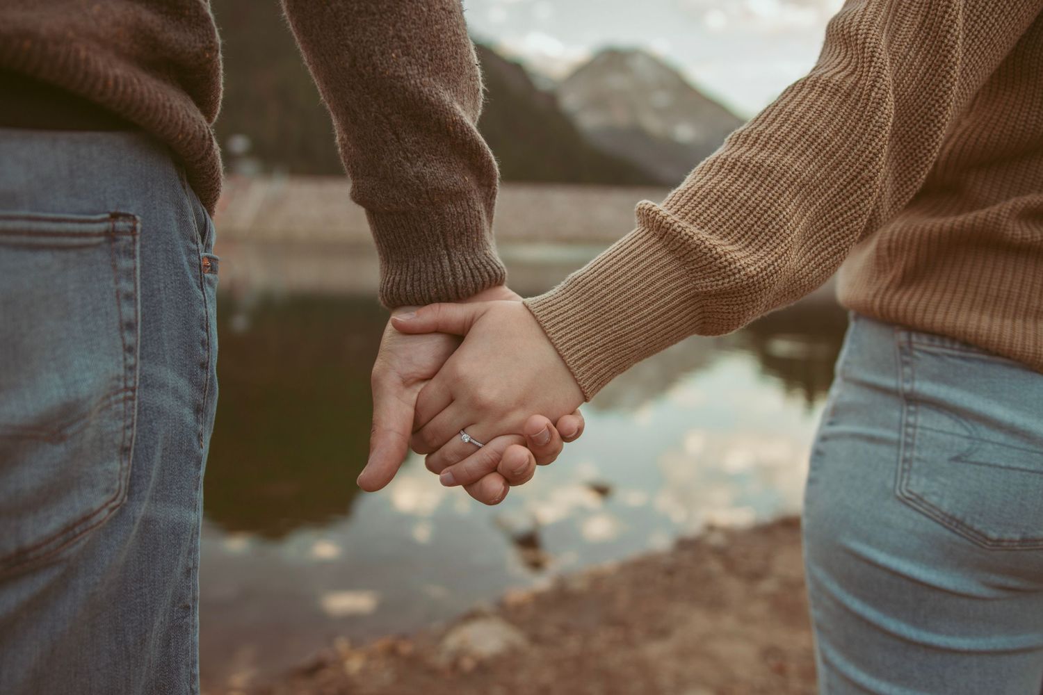 A series of cropped photos showing two people holding hands while walking outdoors at sunset.