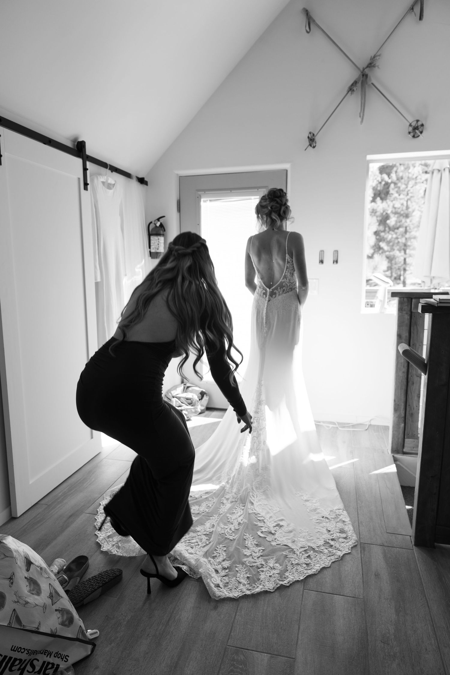 Artistic black and white shots capture the flowing movement of a wedding dress in natural light.