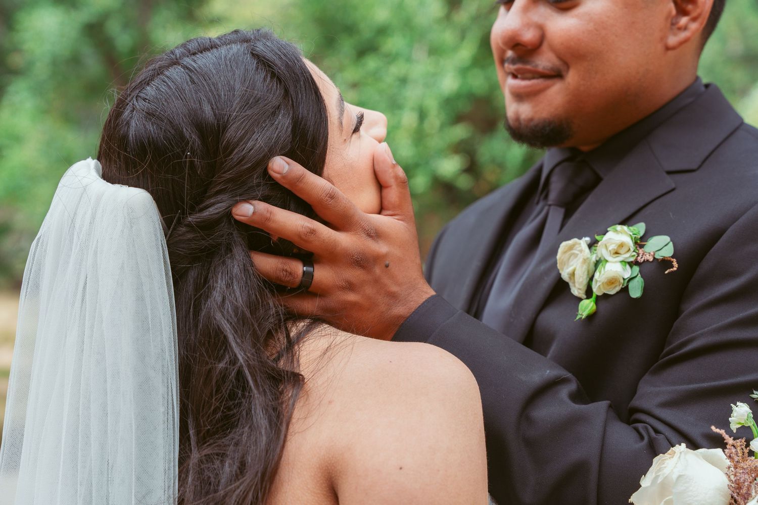 Intimate wedding moments captured between couples in formal attire against natural backdrop.