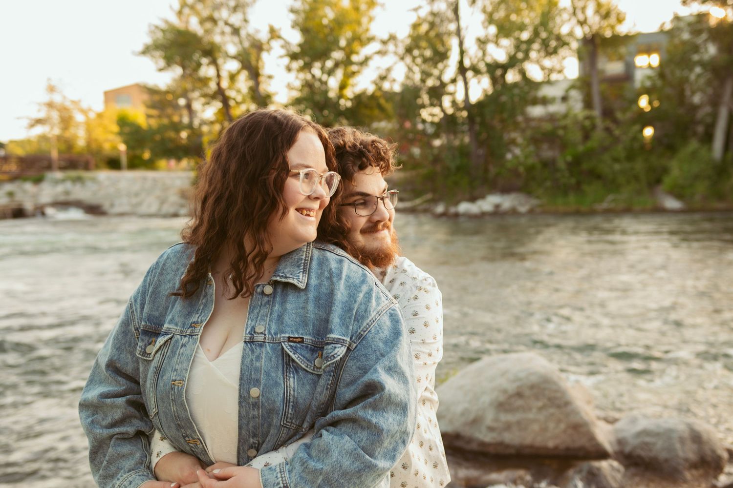 A romantic sunset moment captured by the water's edge.