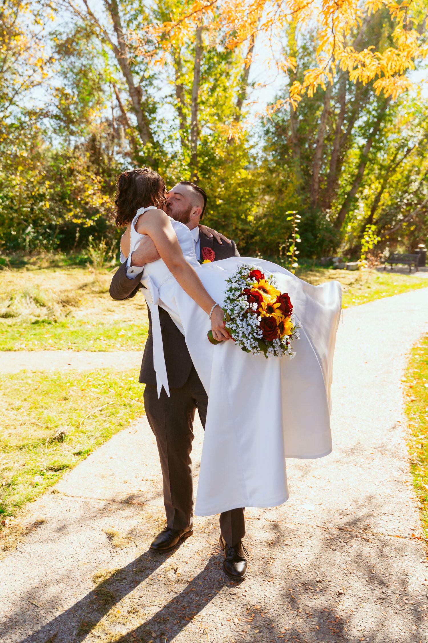 A romantic dance sequence showing a couple twirling amid golden fall leaves.