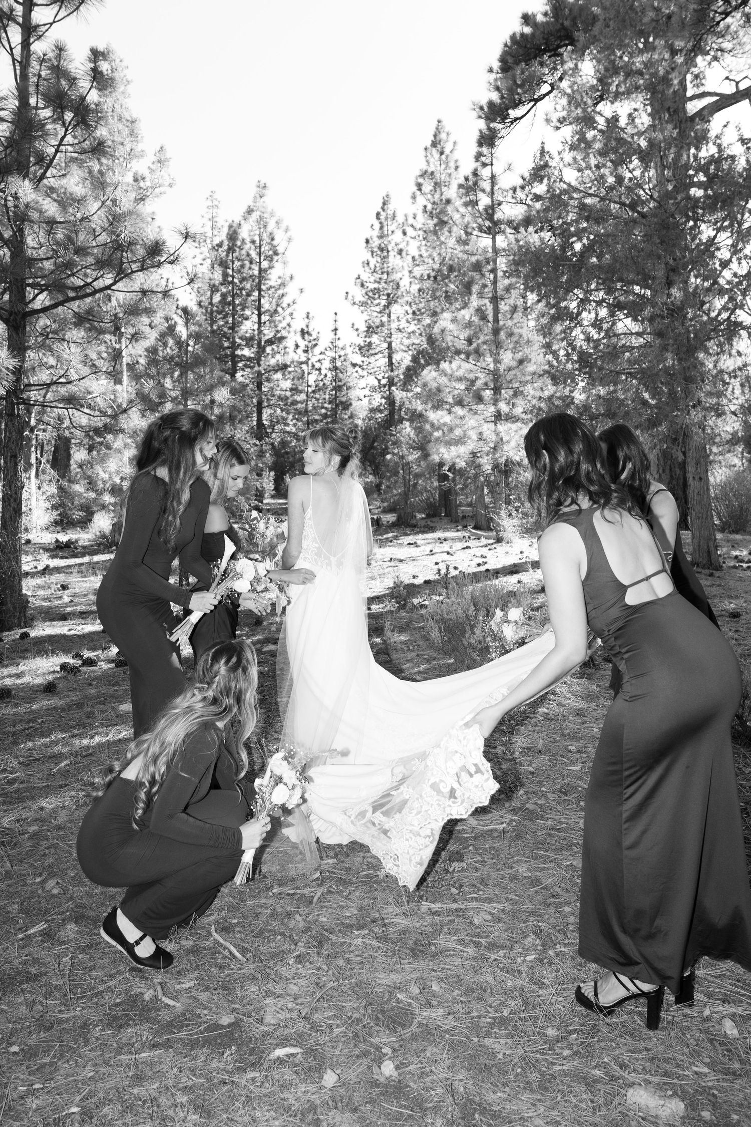 Black and white sequence showing wedding party members dramatically falling in a forest scene.