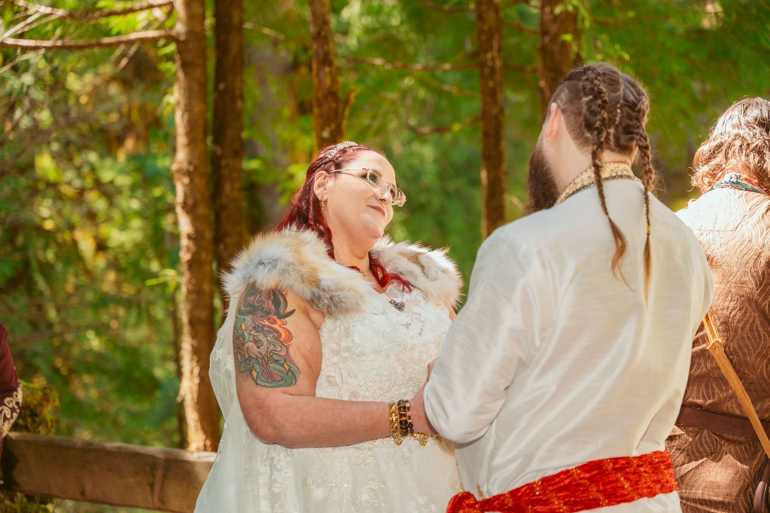 Wedding celebration sequence captured in beautiful forest setting.