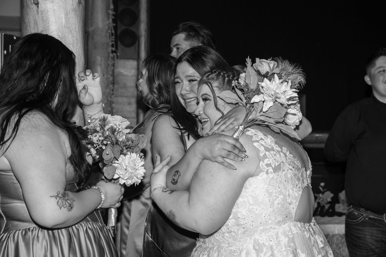 A black and white photo collage shows multiple couples dancing and embracing at what appears to be a wedding reception.