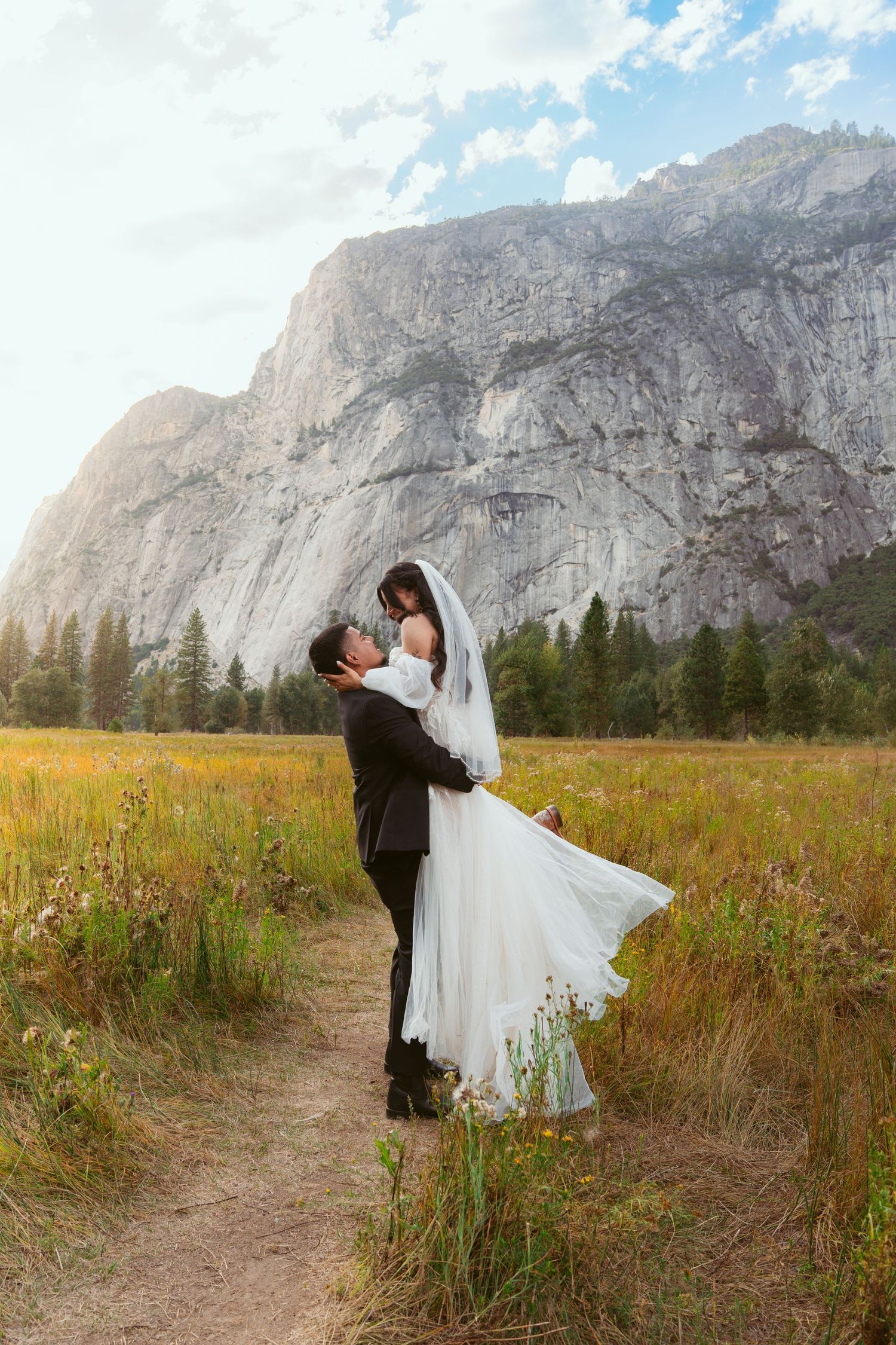 Wedding photography session in Yosemite National Park's scenic valley meadow.