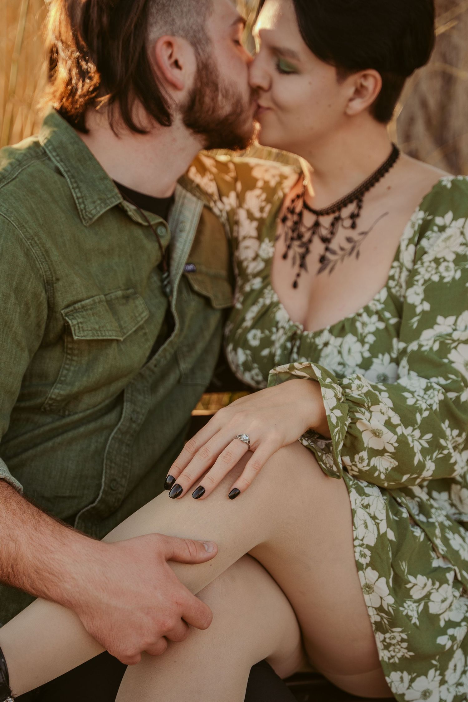 Intimate outdoor portrait of couple with gentle touches and embraces.