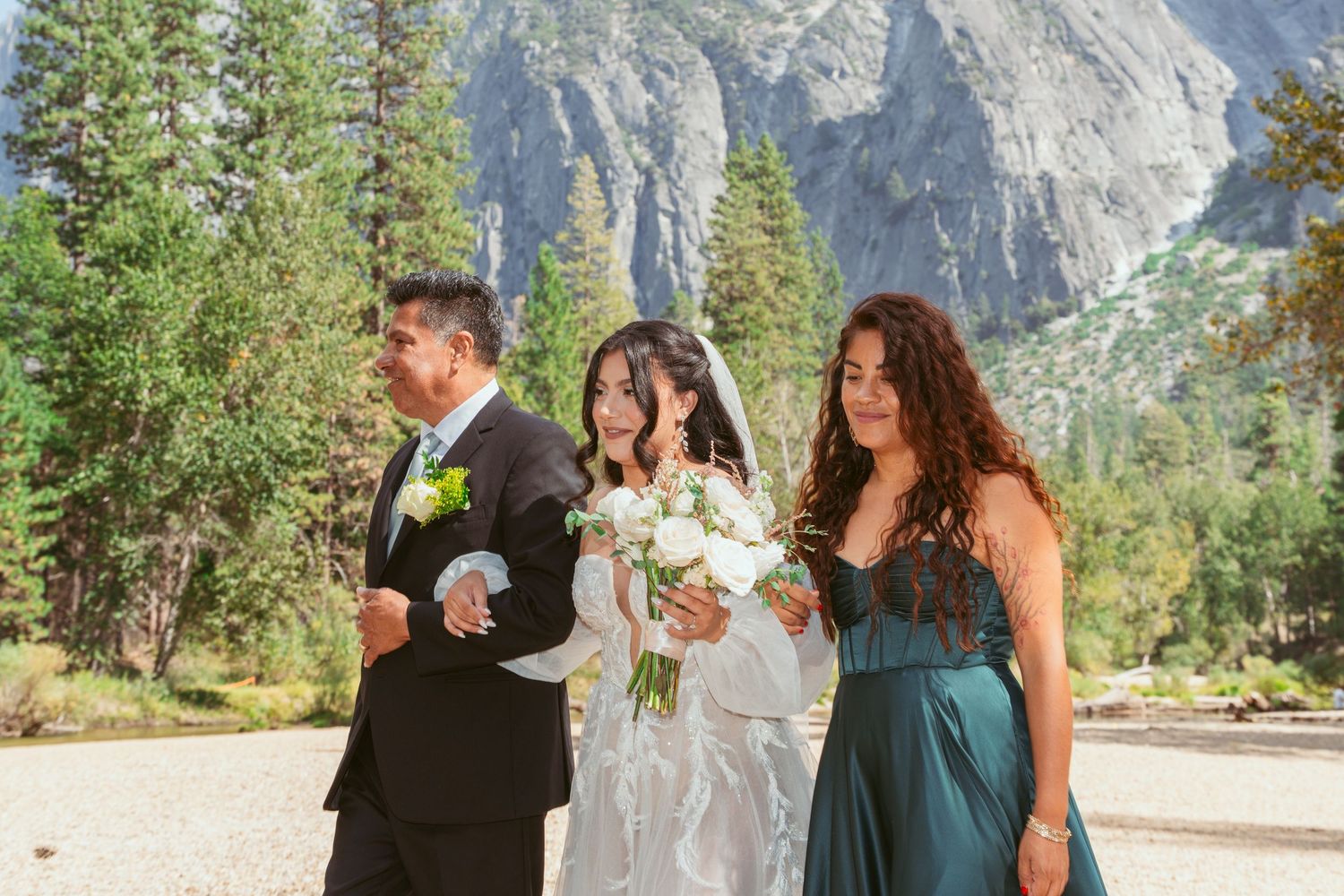 Outdoor wedding ceremony with Half Dome mountain vista in Yosemite Valley.