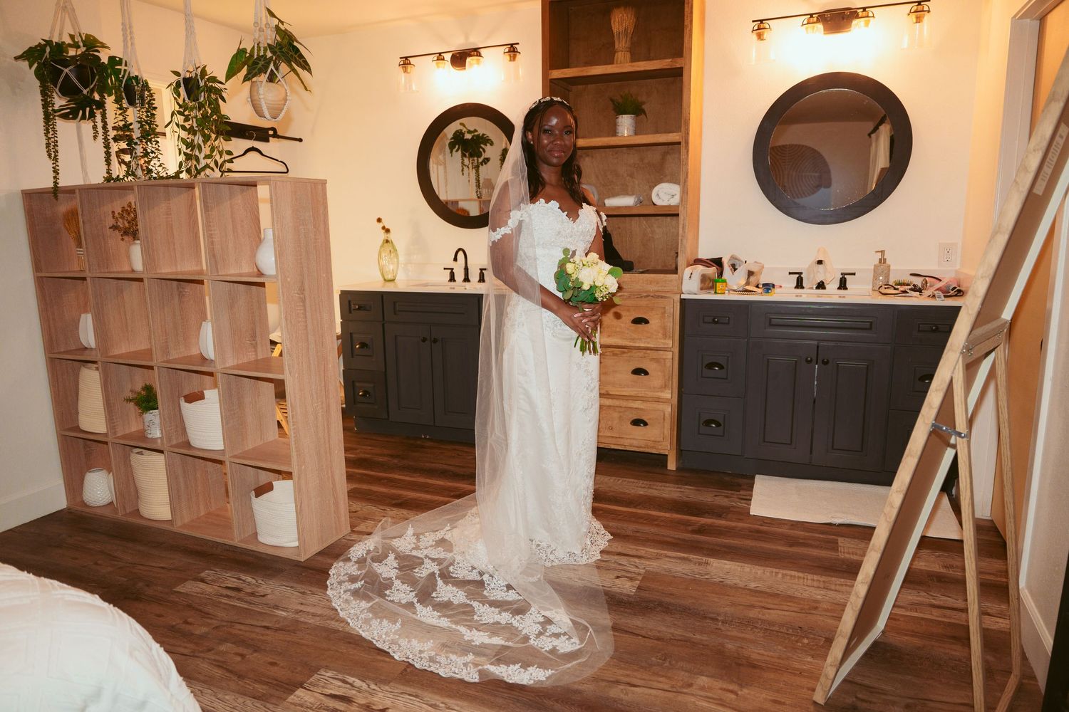 Wedding venue interior with rustic wooden floors and circular wall accents.
