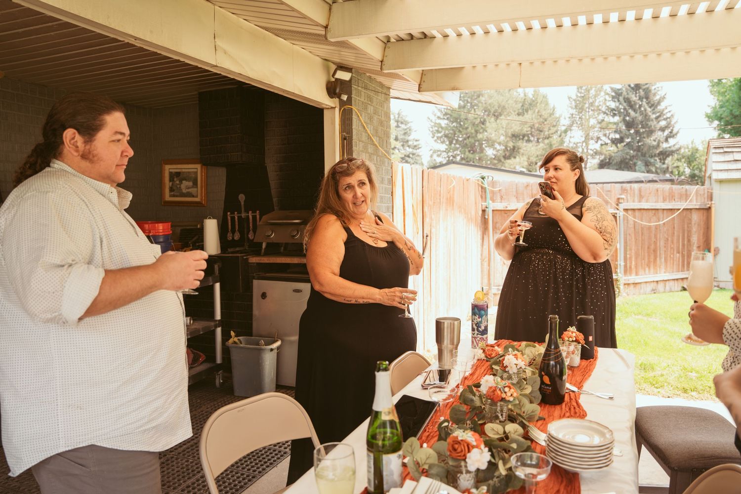 Wedding party preparations and candid moments in a casual indoor setting.