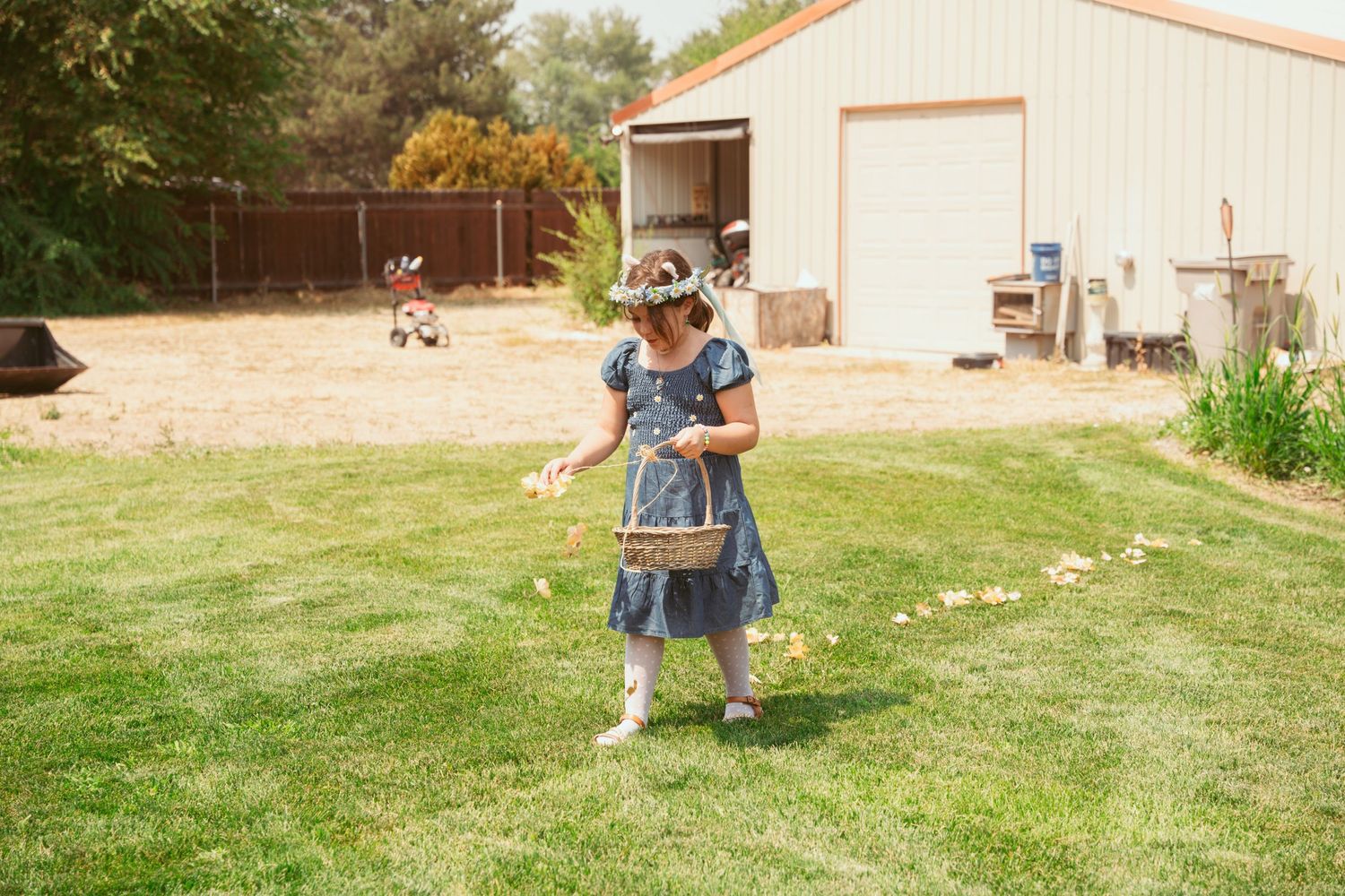 Scenic view of a beige building and lawn during an outdoor event.