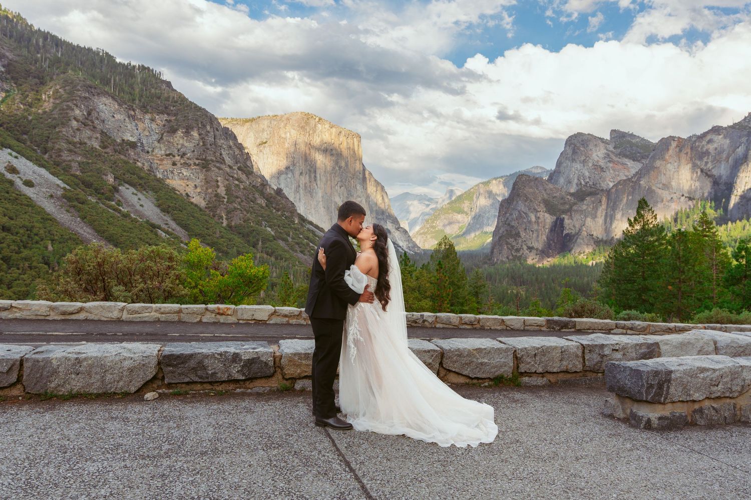 Panoramic wedding photos showcase a couple's romantic moments with Yosemite's dramatic landscape.