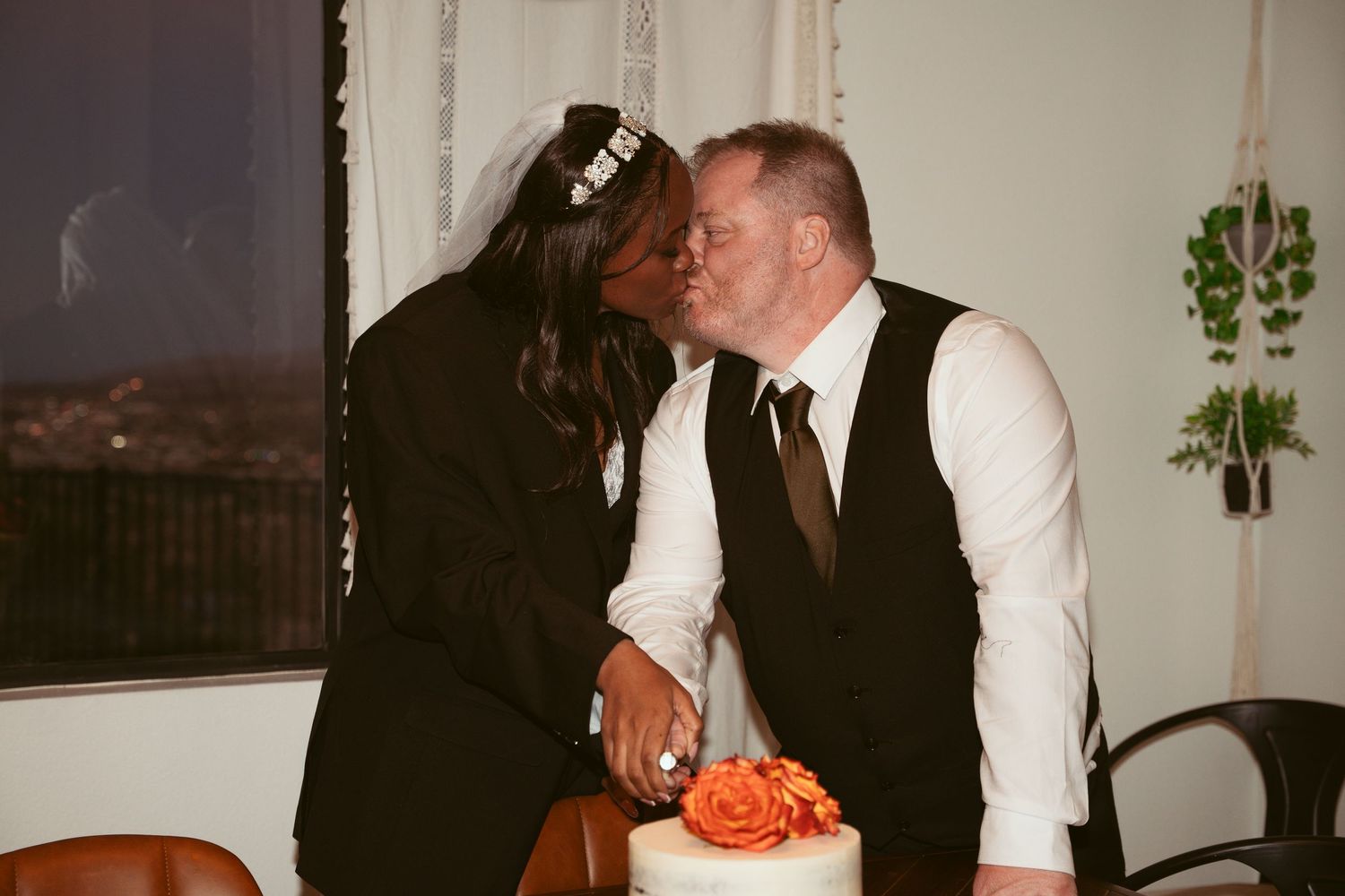 Indoor wedding reception with elegant decor and ambient lighting.