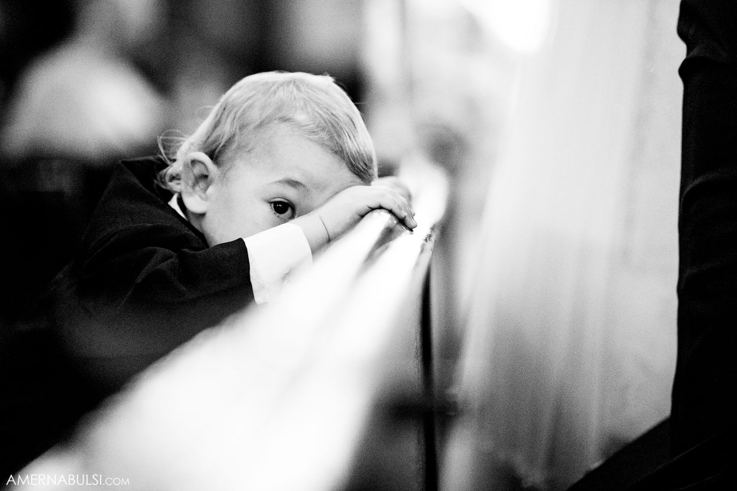 Artistic black and white wedding photography with soft focus and dramatic lighting.