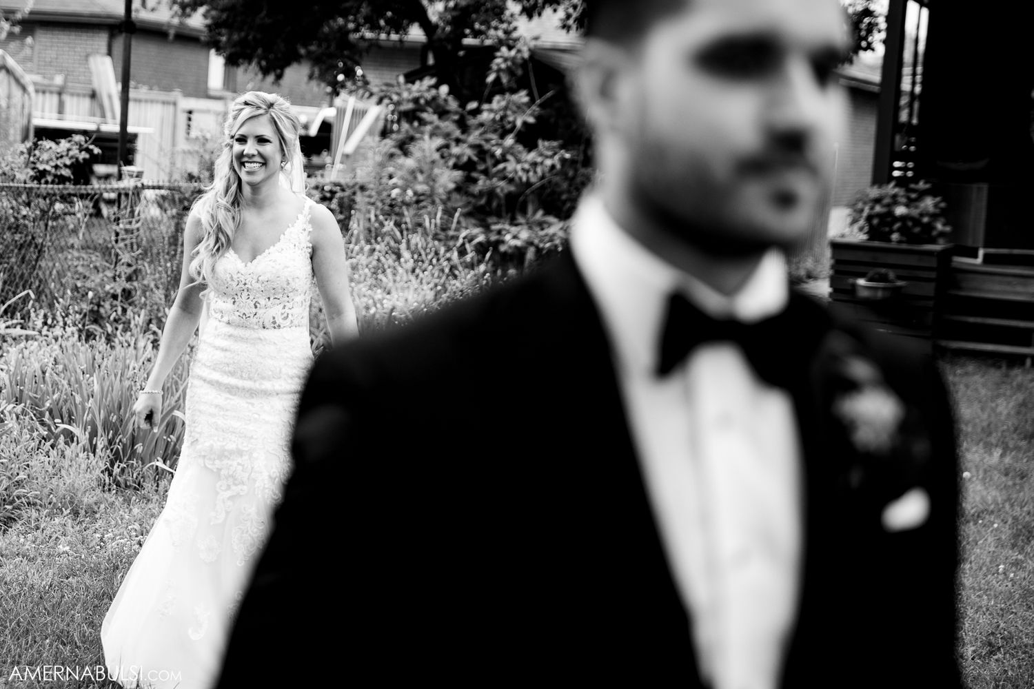 Artistic black and white wedding photography captures intimate moments.