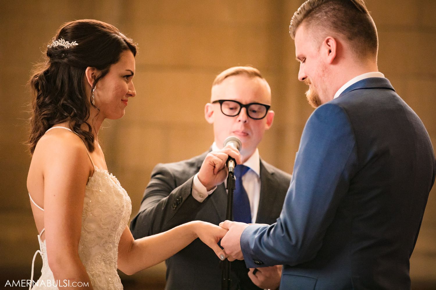 Emotional wedding ceremony moment captured during exchange of vows.