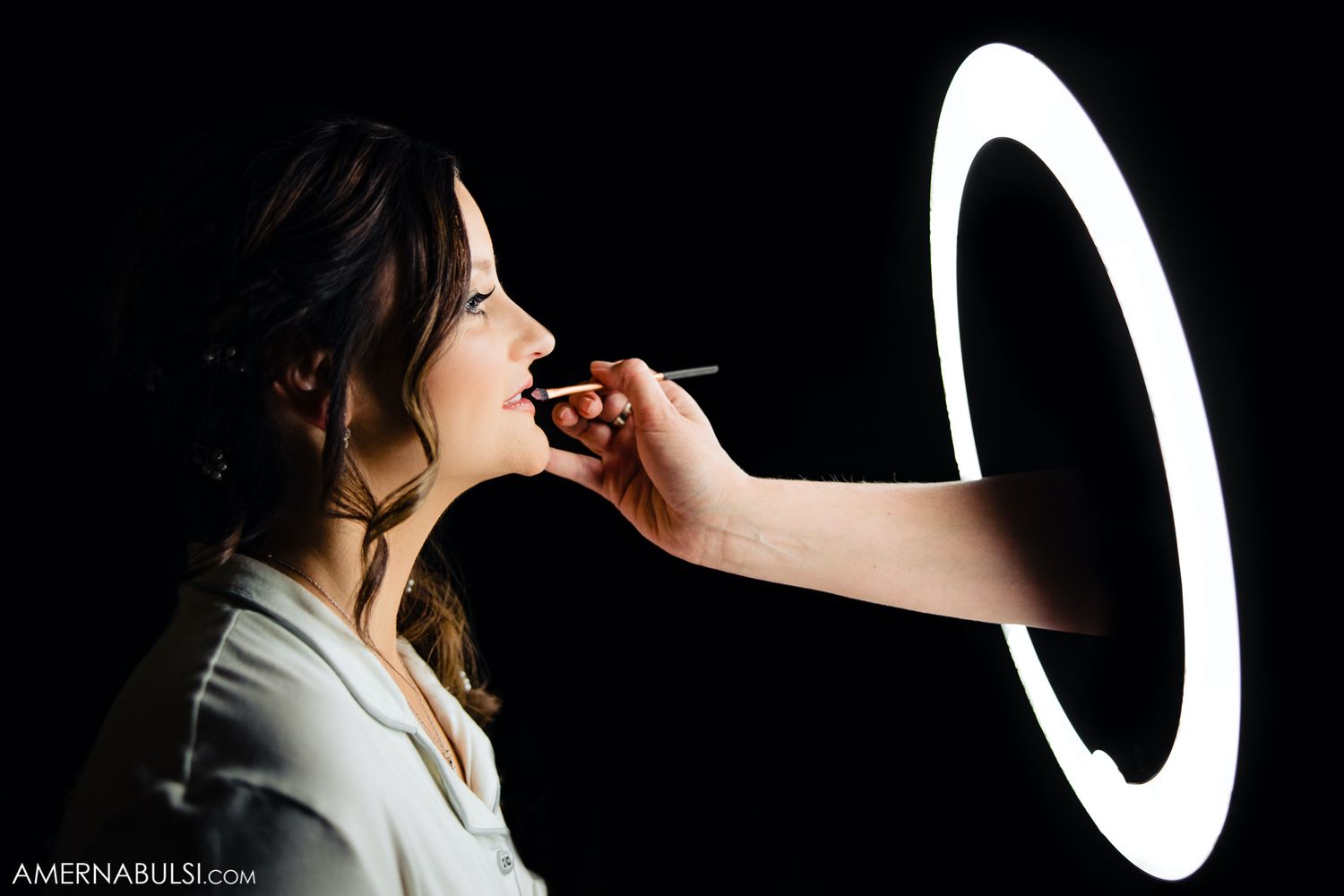 Dramatic black and white silhouette portraits with creative lighting and shadows.