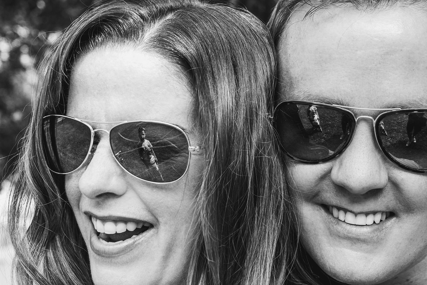 Close-up portrait shots of people wearing sunglasses and smiling outdoors.