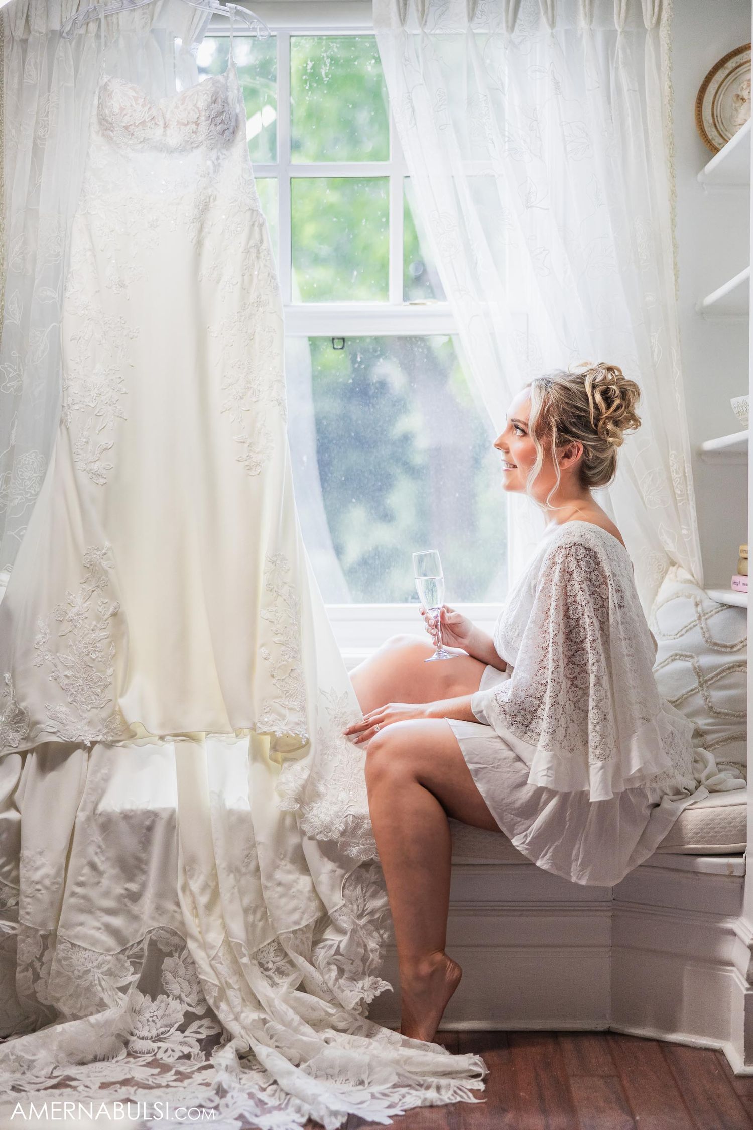 Morning wedding preparation scene with white lace curtains and natural window light.