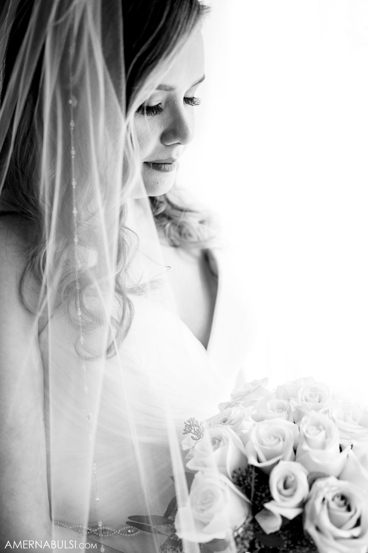 Black and white artistic bridal portraits with roses and veil details.