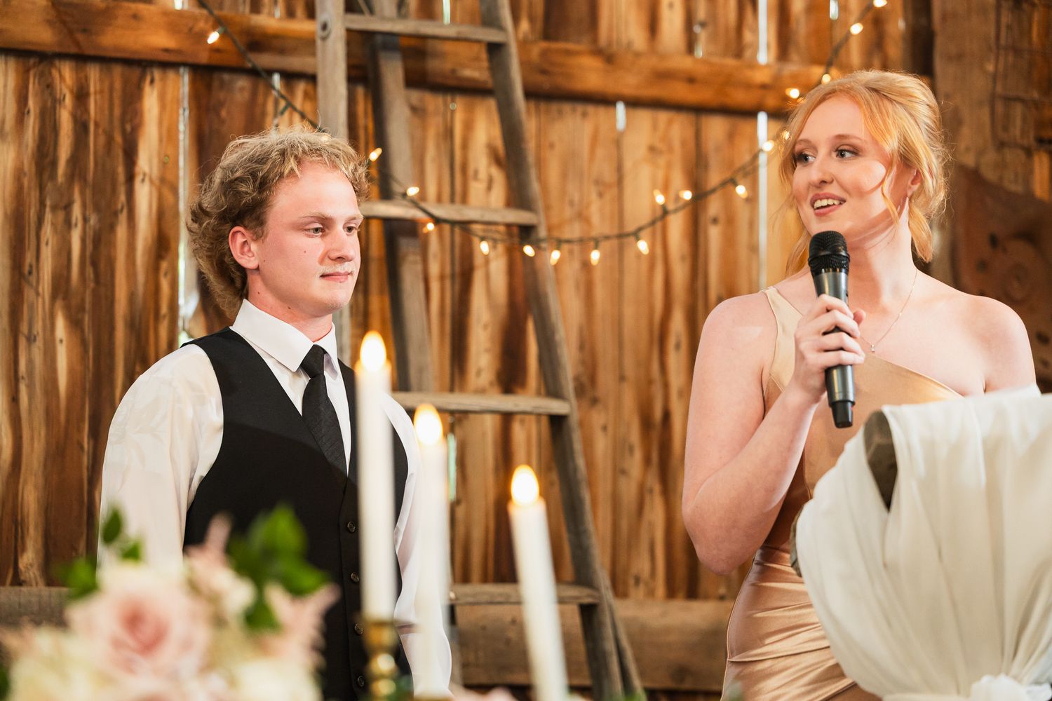 Rustic barn wedding collage with decorative elements and vintage wood backdrop throughout multiple reception scenes.