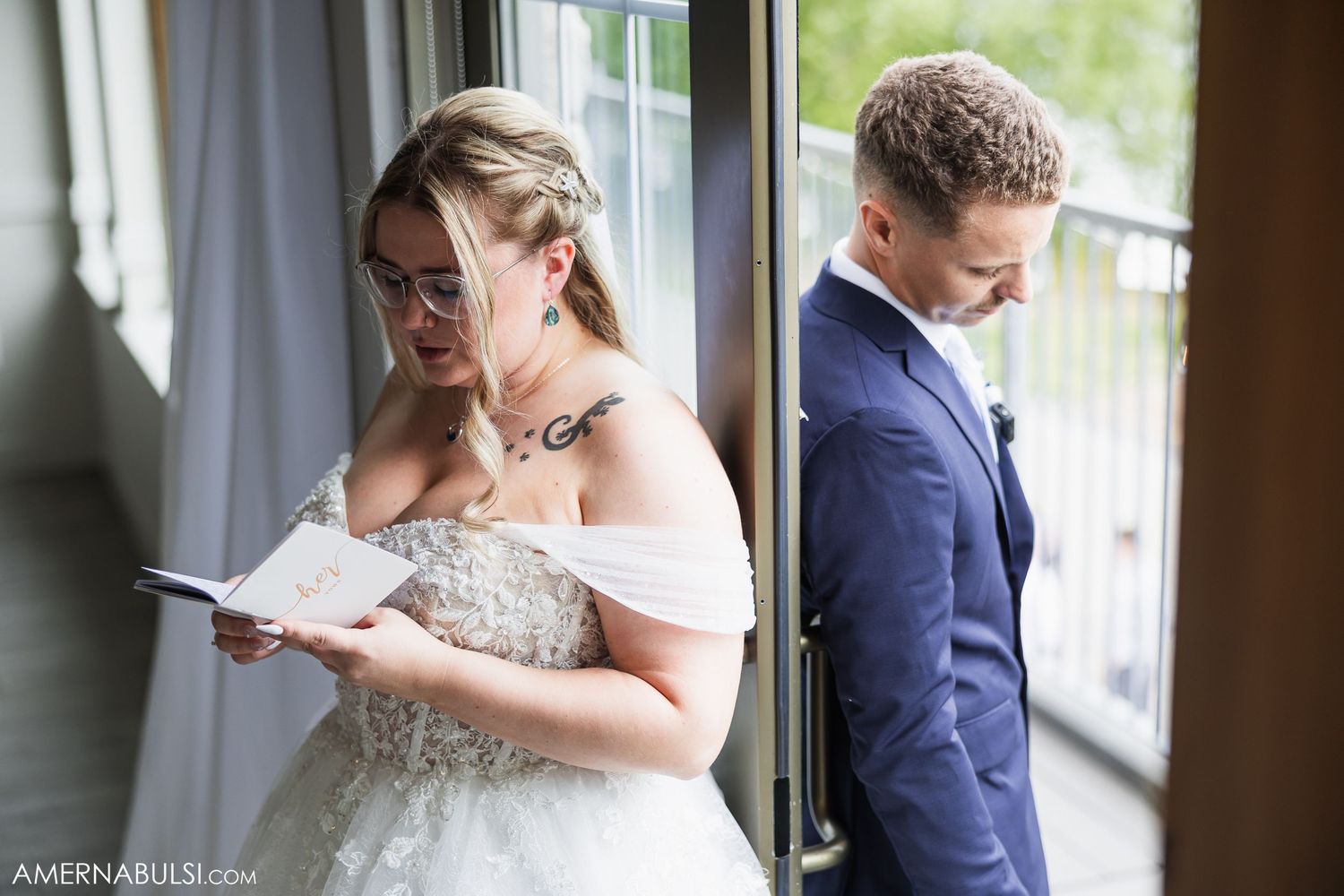 Interior wedding preparation scene with elegant bridal details near sunlit windows.