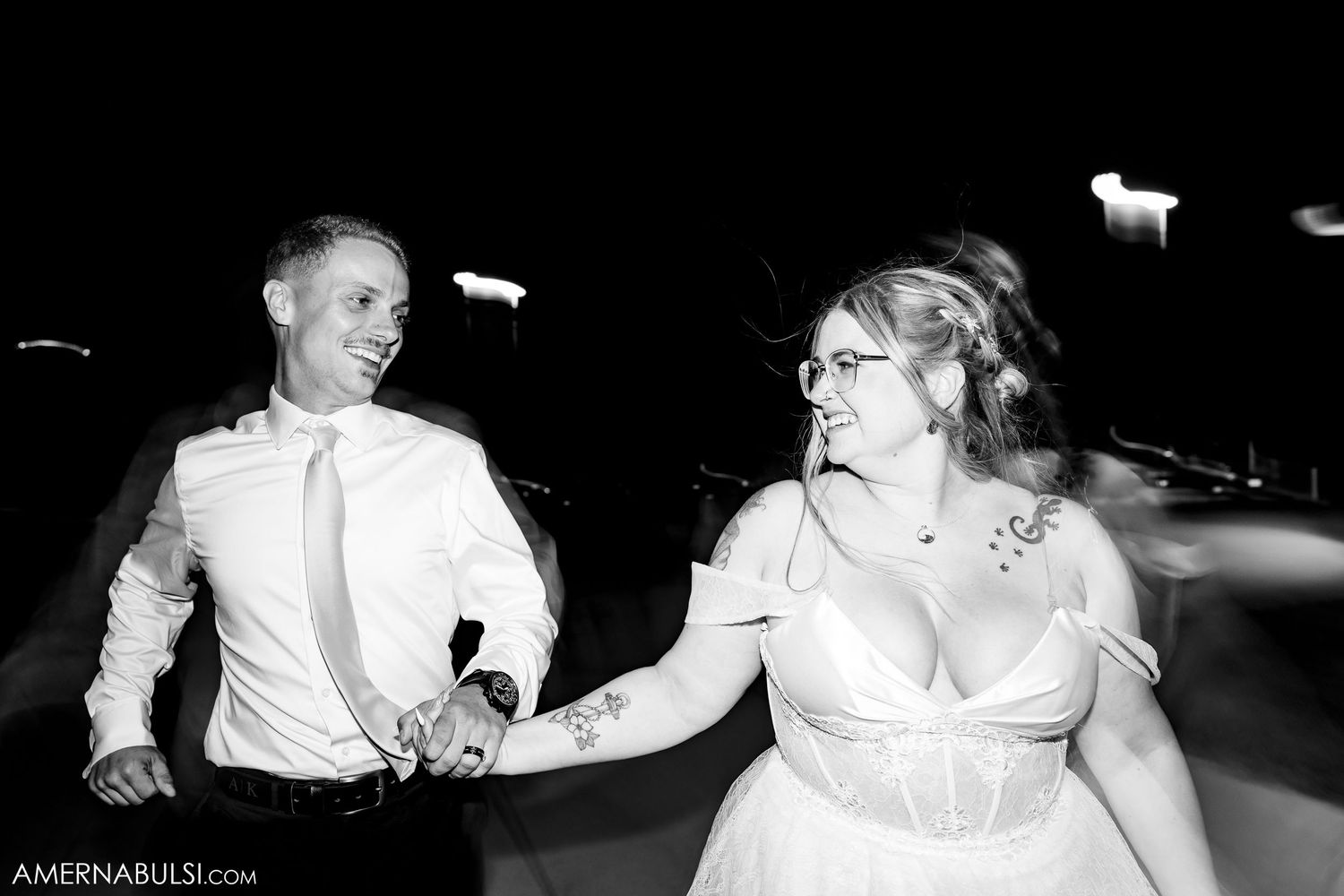 Black and white photos showing romantic first dance moves at a wedding reception.