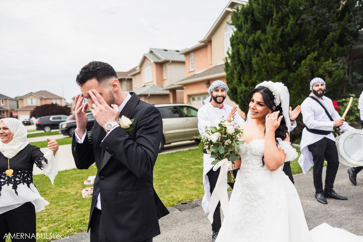 Emotional first look reaction as bride and groom see each other before their wedding ceremony.